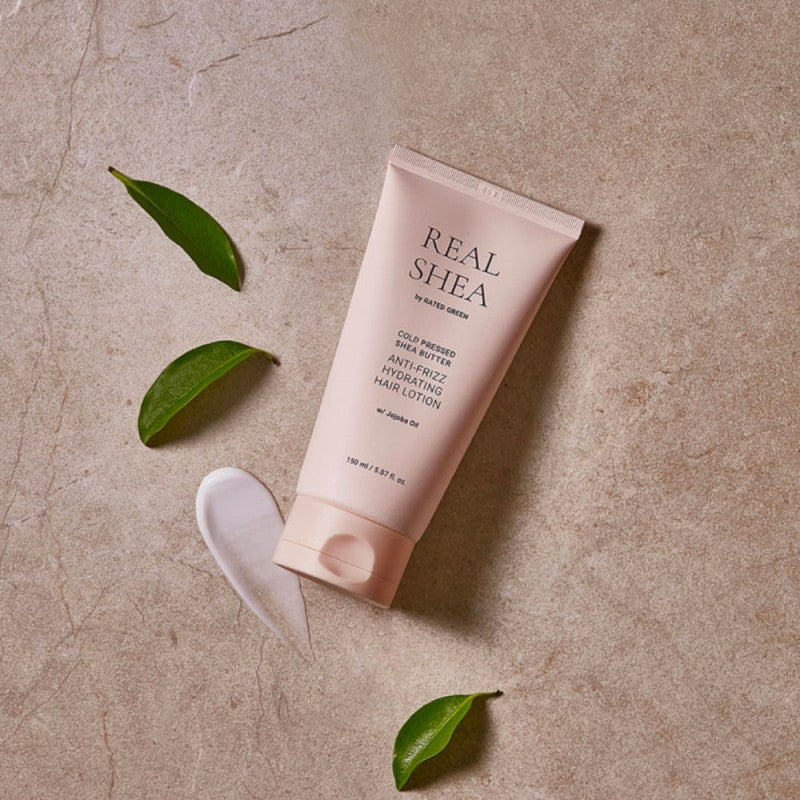REAL SHEA Nenuplaunamas kondicionierius besipučiantiems plaukams “Cold Pressed Shea Butter Anti-Frizz Hair Lotion”