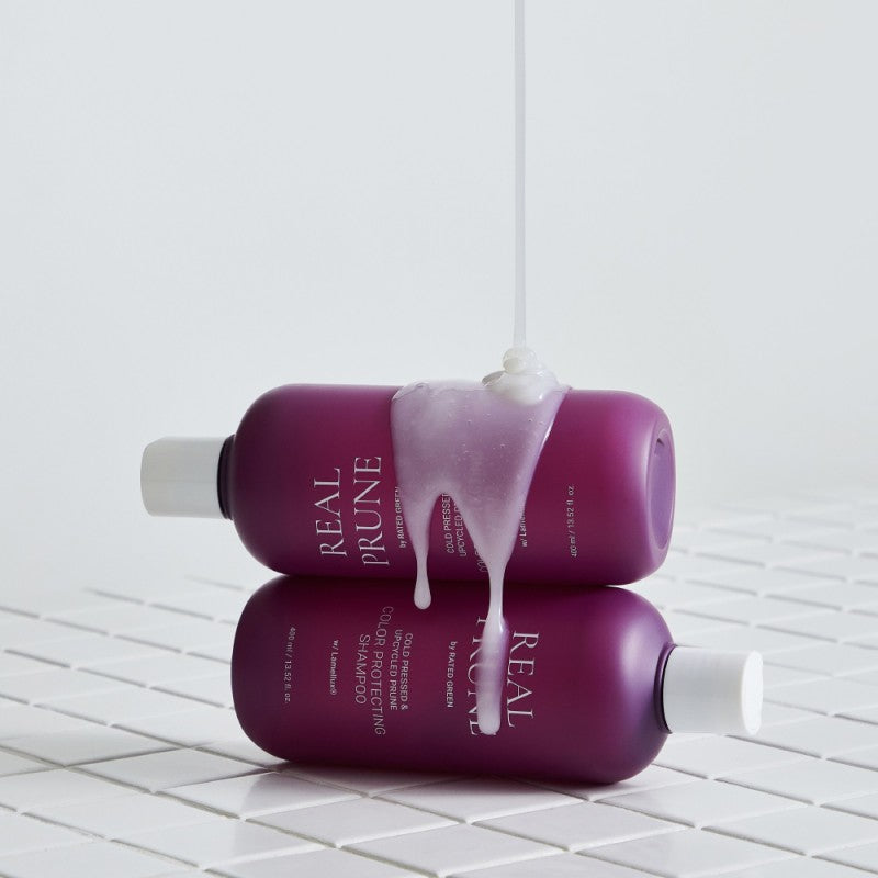 REAL PRUNE Šampūnas dažytiems plaukams "Cold Pressed & Upcycled Prune Protecting Shampoo"